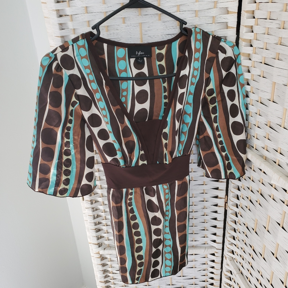 Byline silk blouse